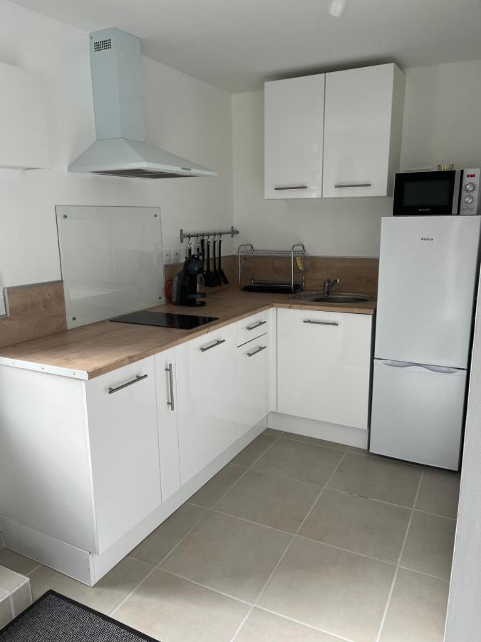 La Petite Maison De Kerguiniou Glomel Bagian luar foto
